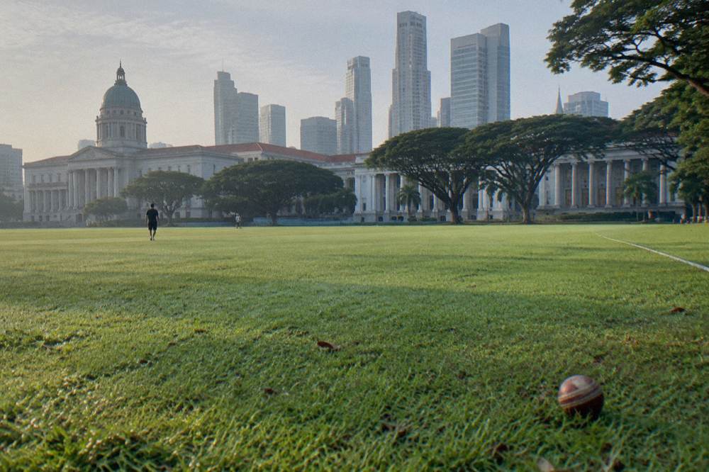 Colonial-era buildings and open green space in Singapore's Civic District