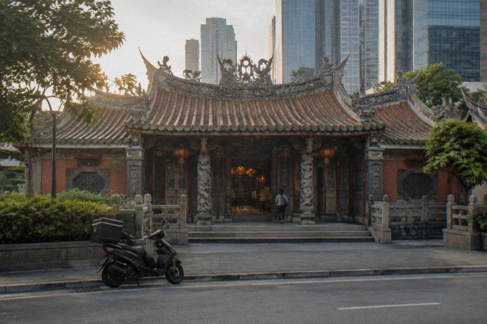 Heritage shophouses and a temple facade in the Singapore River district