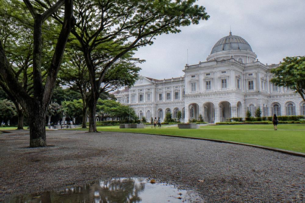 Museum building facade with a wide plaza in front